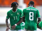 20 May 2023; Romeo Akachukwu of Republic of Ireland, 8, celebrates with teammate Ikechukwu Orazi after scoring their side's third goal during the UEFA European U17 Championship Final Tournament match between Republic of Ireland and Wales at Pancho Aréna in Felcsút, Hungary. Photo by David Balogh/Sportsfile