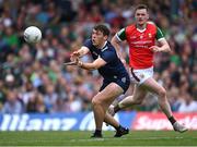 20 May 2023; David Clifford of Kerry passes the ball under pressure from Matthew Ruane of Mayo during the GAA Football All-Ireland Senior Championship Round 1 match between Kerry and Mayo at Fitzgerald Stadium in Killarney, Kerry. Photo by Piaras Ó Mídheach/Sportsfile