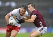 20 May 2023; Darragh Canavan of Tyrone in action against John McGrath of Galway during the GAA Football All-Ireland Senior Championship Round 1 match between Galway and Tyrone at Pearse Stadium in Galway. Photo by Ray Ryan/Sportsfile