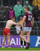 20 May 2023; Peter Harte of Tyrone receives his jersey back from Tyrone goalkeeper Niall Morgan, after playing in goal for ten minutes, during the GAA Football All-Ireland Senior Championship Round 1 match between Galway and Tyrone at Pearse Stadium in Galway. Photo by Ray Ryan/Sportsfile