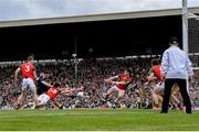 20 May 2023; David Clifford of Kerry shoots under pressure from Mayo defenders during the GAA Football All-Ireland Senior Championship Round 1 match between Kerry and Mayo at Fitzgerald Stadium in Killarney, Kerry. Photo by Piaras Ó Mídheach/Sportsfile