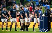 20 May 2023; Leinster players, from left, Hugo Keenan, Jason Jenkins, Andrew Porter, Robbie Henshaw and Ross Byrne, walk past the trophy after the Heineken Champions Cup Final match between Leinster and La Rochelle at Aviva Stadium in Dublin. Photo by Ramsey Cardy/Sportsfile