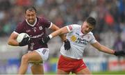 20 May 2023; John Maher of Galway in action against Michael Mc Kernan  of Tyrone during the GAA Football All-Ireland Senior Championship Round 1 match between Galway and Tyrone at Pearse Stadium in Galway. Photo by Ray Ryan/Sportsfile