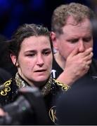 20 May 2023; Katie Taylor, and her manager Brian Peters, after her defeat to Chantelle Cameron in their undisputed super lightweight championship fight at the 3Arena in Dublin. Photo by Stephen McCarthy/Sportsfile