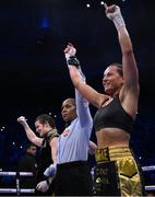 20 May 2023; Katie Taylor, left, reacts as Chantelle Cameron is announced victorious in their undisputed super lightweight championship fight at the 3Arena in Dublin. Photo by Stephen McCarthy/Sportsfile