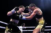20 May 2023; Katie Taylor, left, and Chantelle Cameron during their undisputed super lightweight championship fight at the 3Arena in Dublin. Photo by Stephen McCarthy/Sportsfile