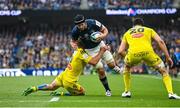 20 May 2023; Caelan Doris of Leinster is tackled by Tawera Kerr Barlow of La Rochelle during the Heineken Champions Cup Final match between Leinster and La Rochelle at Aviva Stadium in Dublin. Photo by Brendan Moran/Sportsfile