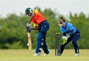21 May 2023; Mary-Anne Musonda of Scorchers and Typhoons wicket-keeper Mary Waldron during the Evoke Super Series match between Typhoons and Scorchers at Oak Hill Cricket Club in Kilbride, Wicklow. Photo by Seb Daly/Sportsfile
