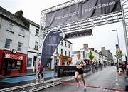 21 May 2023; Courtney McGuire of Clonmel AC, Tipperary, crosses the line to win the women's race during the Ashling Murphy 4 Miler, part of the Peugeot Race Series, in Tullamore, Offaly. Photo by Harry Murphy/Sportsfile