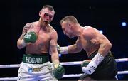 20 May 2023; Dennis Hogan, left, and James Metcalf during their IBO world super-welterweight title fight at the 3Arena in Dublin. Photo by Stephen McCarthy/Sportsfile