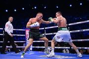 20 May 2023; Dennis Hogan, right, and James Metcalf during their IBO world super-welterweight title fight at the 3Arena in Dublin. Photo by Stephen McCarthy/Sportsfile