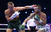 20 May 2023; Dennis Hogan, right, and James Metcalf during their IBO world super-welterweight title fight at the 3Arena in Dublin. Photo by Stephen McCarthy/Sportsfile