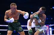 20 May 2023; Dennis Hogan, right, and James Metcalf during their IBO world super-welterweight title fight at the 3Arena in Dublin. Photo by Stephen McCarthy/Sportsfile