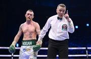 20 May 2023; Dennis Hogan is deducted a point during his IBO world super-welterweight title fight James Metcalf at the 3Arena in Dublin. Photo by Stephen McCarthy/Sportsfile