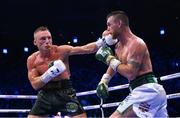 20 May 2023; Dennis Hogan, right, and James Metcalf during their IBO world super-welterweight title fight at the 3Arena in Dublin. Photo by Stephen McCarthy/Sportsfile