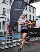 21 May 2023; Fiona Clinton of Dundrum South Dublin crosses the line to finish as second women during the Ashling Murphy 4 Miler, part of the Peugeot Race Series, in Tullamore, Offaly. Photo by Harry Murphy/Sportsfile
