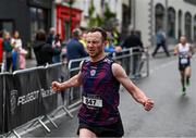 21 May 2023; Andrew Nevin of Mullingar Harriers, Westmeath, crosses the line during the Ashling Murphy 4 Miler, part of the Peugeot Race Series, in Tullamore, Offaly. Photo by Harry Murphy/Sportsfile