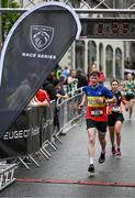 21 May 2023; Keith Quinn crosses the line during the Ashling Murphy 4 Miler, part of the Peugeot Race Series, in Tullamore, Offaly. Photo by Harry Murphy/Sportsfile