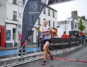 21 May 2023; Fiona Clinton of Dundrum South Dublin crosses the line to finish as second women during the Ashling Murphy 4 Miler, part of the Peugeot Race Series, in Tullamore, Offaly. Photo by Harry Murphy/Sportsfile