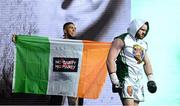 20 May 2023; Thomas Carty is walked to the ring by UFC figher Johnny Walker for his vacant Boxing Union of Ireland celtic heavyweight title fight with Jay McFarlane at the 3Arena in Dublin. Photo by Stephen McCarthy/Sportsfile