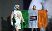 20 May 2023; Thomas Carty is walked to the ring by UFC figher Johnny Walker for his vacant Boxing Union of Ireland celtic heavyweight title fight with Jay McFarlane at the 3Arena in Dublin. Photo by Stephen McCarthy/Sportsfile