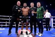 20 May 2023; Caoimhin Agyarko with his team, from left, John Hodkinson, Declan O'Rourke and Andy O'Neill following his middlewieght bout with Grant Dennis at the 3Arena in Dublin. Photo by Stephen McCarthy/Sportsfile