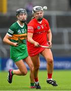 21 May 2023; Rachel Harty of Cork races clear of Áine O'Connor of Kerry during the Munster Intermediate Camogie Final match between Cork and Kerry at Cusack Park in Ennis, Clare. Photo by Ray McManus/Sportsfile