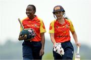 21 May 2023; Scorchers batters Mary-Anne Musonda, left, and Polly Inglis after their innings during the Evoke Super Series match between Typhoons and Scorchers at Oak Hill Cricket Club in Kilbride, Wicklow. Photo by Seb Daly/Sportsfile