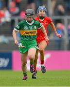 21 May 2023; Caoimhe Spillane of Kerry is tackled by Rose Murphy of Cork during the Munster Intermediate Camogie Final match between Cork and Kerry at Cusack Park in Ennis, Clare. Photo by Ray McManus/Sportsfile