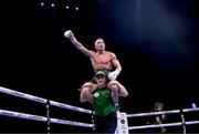 20 May 2023; James Metcalf celebrates with trainer Joseph McNally after his IBO world super-welterweight title fight Dennis Hogan at the 3Arena in Dublin. Photo by Stephen McCarthy/Sportsfile