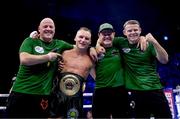 20 May 2023; James Metcalf celebrates with his team, from left, John Hodkinson, Joseph McNally and Declan O'Rourke following his IBO world super-welterweight title fight Dennis Hogan at the 3Arena in Dublin. Photo by Stephen McCarthy/Sportsfile