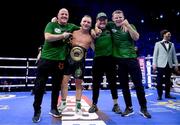 20 May 2023; James Metcalf celebrates with his team, from left, John Hodkinson, Joseph McNally and Declan O'Rourke following his IBO world super-welterweight title fight Dennis Hogan at the 3Arena in Dublin. Photo by Stephen McCarthy/Sportsfile