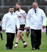 21 May 2023; Down substitute goalkeeper Niall Kane alongside umpires Aaron Mulryan, left, and John Murphy before the Tailteann Cup Group 2 Round 2 match between Tipperary and Down at FBD Semple Stadium in Thurles, Tipperary. Photo by Piaras Ó Mídheach/Sportsfile