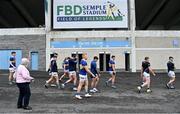 21 May 2023; Tipperary players make their way to the pitch after their warm-up in Dr Morris Park before the Tailteann Cup Group 2 Round 2 match between Tipperary and Down at FBD Semple Stadium in Thurles, Tipperary. Photo by Piaras Ó Mídheach/Sportsfile