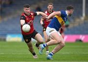 21 May 2023; Daniel Guinness of Down in action against Luke Boland of Tipperary during the Tailteann Cup Group 2 Round 2 match between Tipperary and Down at FBD Semple Stadium in Thurles, Tipperary. Photo by Brendan Moran/Sportsfile