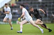 21 May 2023; Kevin Flynn of Kildare in action against Brian Cox of Sligo during the GAA Football All-Ireland Senior Championship Round 1 match between Sligo and Kildare at Markievicz Park in Sligo. Photo by Ramsey Cardy/Sportsfile