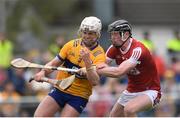 21 May 2023; Adam Hogan of Clare in action against Conor Cahalane of Cork during the Munster GAA Hurling Senior Championship Round 4 match between Clare and Cork at Cusack Park in Ennis, Clare. Photo by John Sheridan/Sportsfile