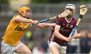21 May 2023; Declan McLoughlin of Galway is tackled by Conor Boyd of Antrim during the Leinster GAA Hurling Senior Championship Round 4 match between Galway and Antrim at Pearse Stadium in Galway. Photo by Tom Beary/Sportsfile