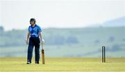 21 May 2023; Typhoons batter Louise Little leaves the crease after being bowled out by Dragons bowler Alana Dalzell during the Evoke Super Series match between Dragons and Typhoons at Oak Hill Cricket Club in Kilbride, Wicklow. Photo by Seb Daly/Sportsfile