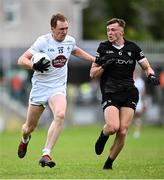 21 May 2023; Paul Cribbin of Kildare in action against Brian Cox of Sligo during the GAA Football All-Ireland Senior Championship Round 1 match between Sligo and Kildare at Markievicz Park in Sligo. Photo by Ramsey Cardy/Sportsfile