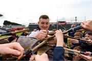 21 May 2023; Eanna Murphy of Galway signs autographs for supporters after the Leinster GAA Hurling Senior Championship Round 4 match between Galway and Antrim at Pearse Stadium in Galway. Photo by Tom Beary/Sportsfile