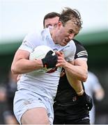 21 May 2023; Darragh Kirwan of Kildare in action against Eddie McGuinness of Sligo during the GAA Football All-Ireland Senior Championship Round 1 match between Sligo and Kildare at Markievicz Park in Sligo. Photo by Ramsey Cardy/Sportsfile