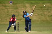 21 May 2023; Typhoons batter Ava Canning and Dragons wicket-keeper Amy Hunter during the Evoke Super Series match between Dragons and Typhoons at Oak Hill Cricket Club in Kilbride, Wicklow. Photo by Seb Daly/Sportsfile