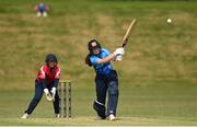 21 May 2023; Typhoons batter Ava Canning and Dragons wicket-keeper Amy Hunter during the Evoke Super Series match between Dragons and Typhoons at Oak Hill Cricket Club in Kilbride, Wicklow. Photo by Seb Daly/Sportsfile