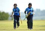 21 May 2023; Typhoons batters Mary Waldron, right, and Georgina Dempsey during the Evoke Super Series match between Dragons and Typhoons at Oak Hill Cricket Club in Kilbride, Wicklow. Photo by Seb Daly/Sportsfile