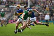 21 May 2023; William O'Donoghue of Limerick in action against Gearod O'Connor of Tipperary during the Munster GAA Hurling Senior Championship Round 4 match between Tipperary and Limerick at FBD Semple Stadium in Thurles, Tipperary. Photo by Brendan Moran/Sportsfile