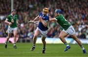 21 May 2023; Mark Kehoe of Tipperary is tackled by Michael Casey of Limerick during the Munster GAA Hurling Senior Championship Round 4 match between Tipperary and Limerick at FBD Semple Stadium in Thurles, Tipperary. Photo by Brendan Moran/Sportsfile
