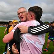 21 May 2023; Adam Hogan of Clare and manager Brian Lohan celebrate after the Munster GAA Hurling Senior Championship Round 4 match between Clare and Cork at Cusack Park in Ennis, Clare. Photo by Ray McManus/Sportsfile