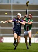 21 May 2023; Oisin Foley of Wexford in action against Johnny Bermingham of Westmeath during the Leinster GAA Hurling Senior Championship Round 4 match between Wexford and Westmeath at Chadwicks Wexford Park in Wexford. Photo by Daire Brennan/Sportsfile