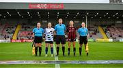 20 May 2023; Referee Mark Houlihan, and assistants Kate O'Brien and Sarah Dyas, with team captains Laurie Ryan of Athlone Town and Erica Burke of Bohemians before the SSE Airtricity Women's Premier Division match between Bohemians and Athlone Town at Dalymount Park in Dublin. Photo by Seb Daly/Sportsfile